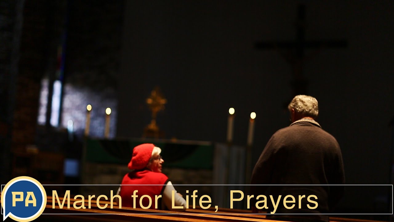 March for Life, supporters pray on the way to Washington D.C.