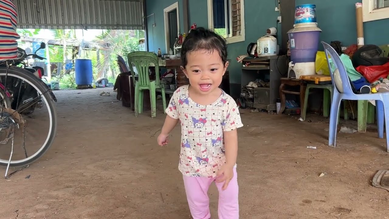 The little girl wants to help her father with his work.