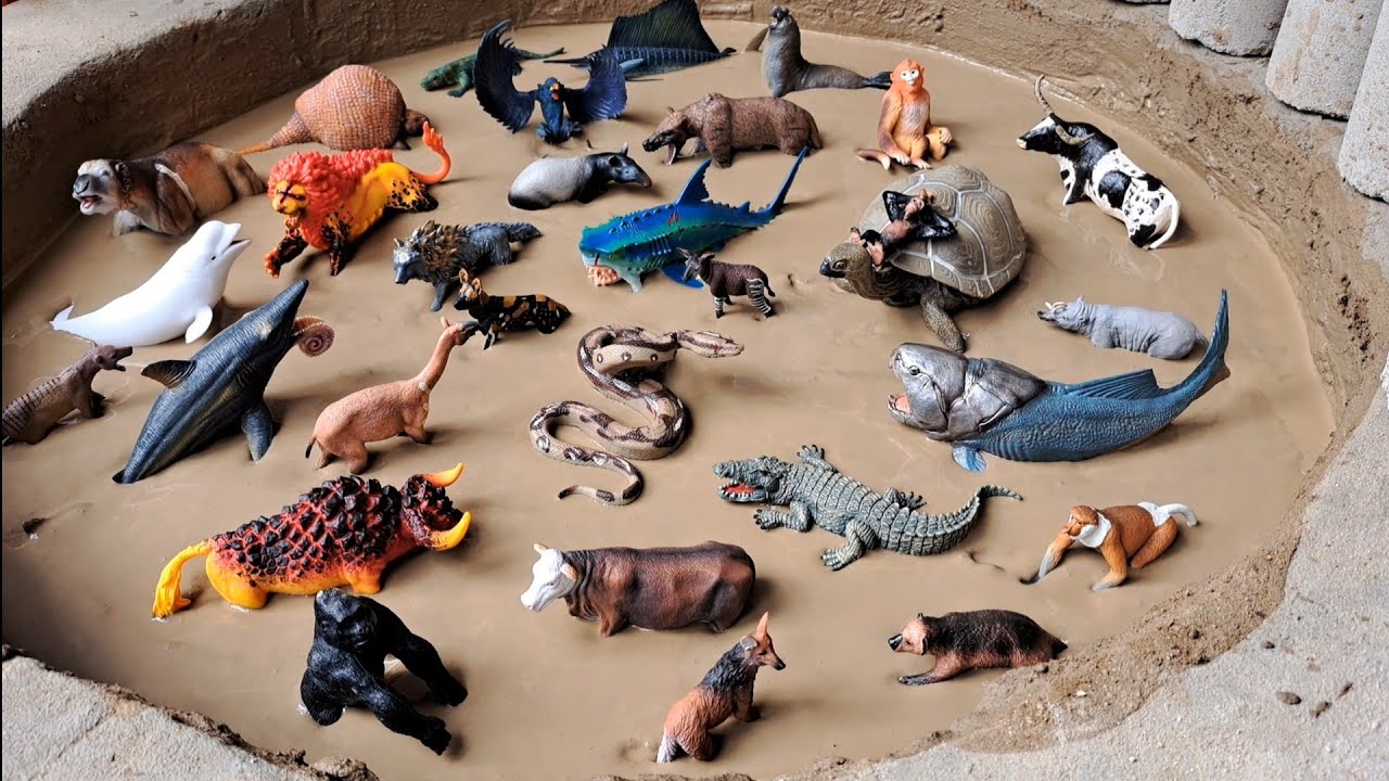 Animais de Plástico Presos na Lama Vaca Boi Tubarão Leão Crocodilo Elefante Marinho Macaco Dourado