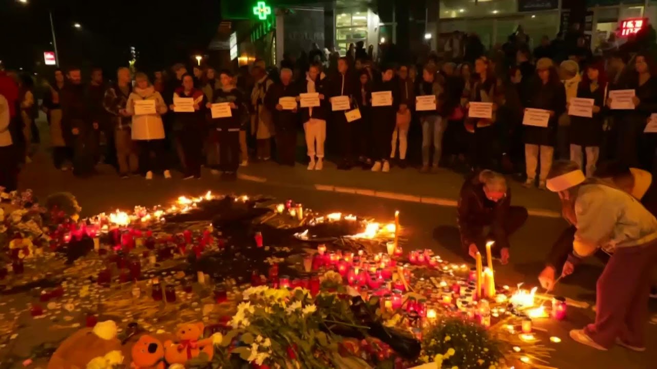 Serbs light candles to honour victims of fatal railway roof collapse
