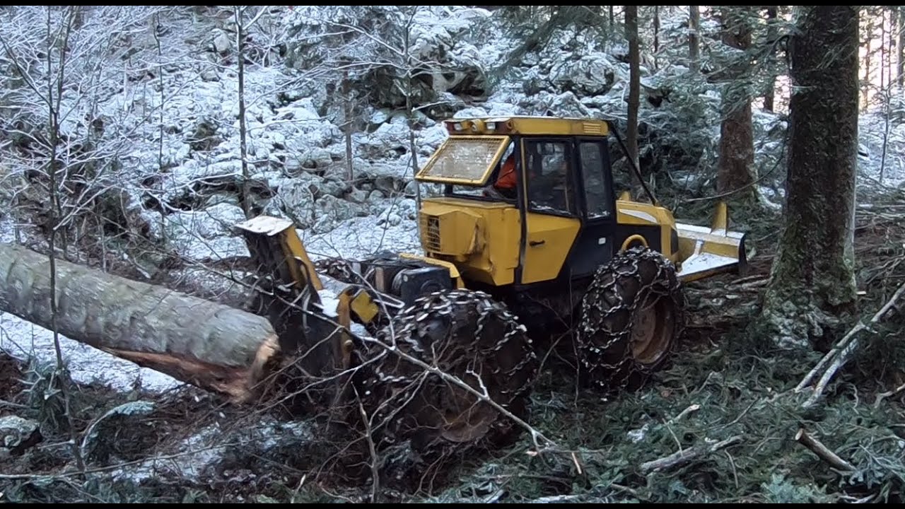 Skidder Ecotrac on heavy Rocks and Snow!
