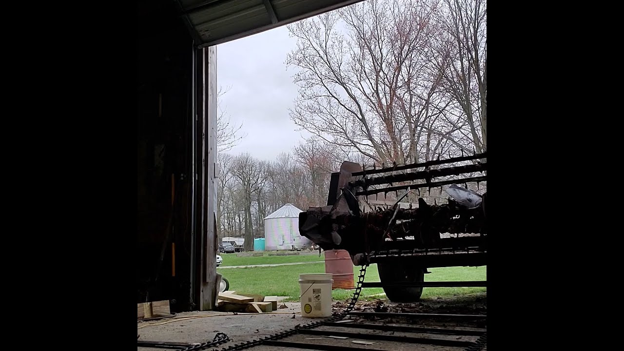 Putting the New Manure Spreader Chain in New Idea 214