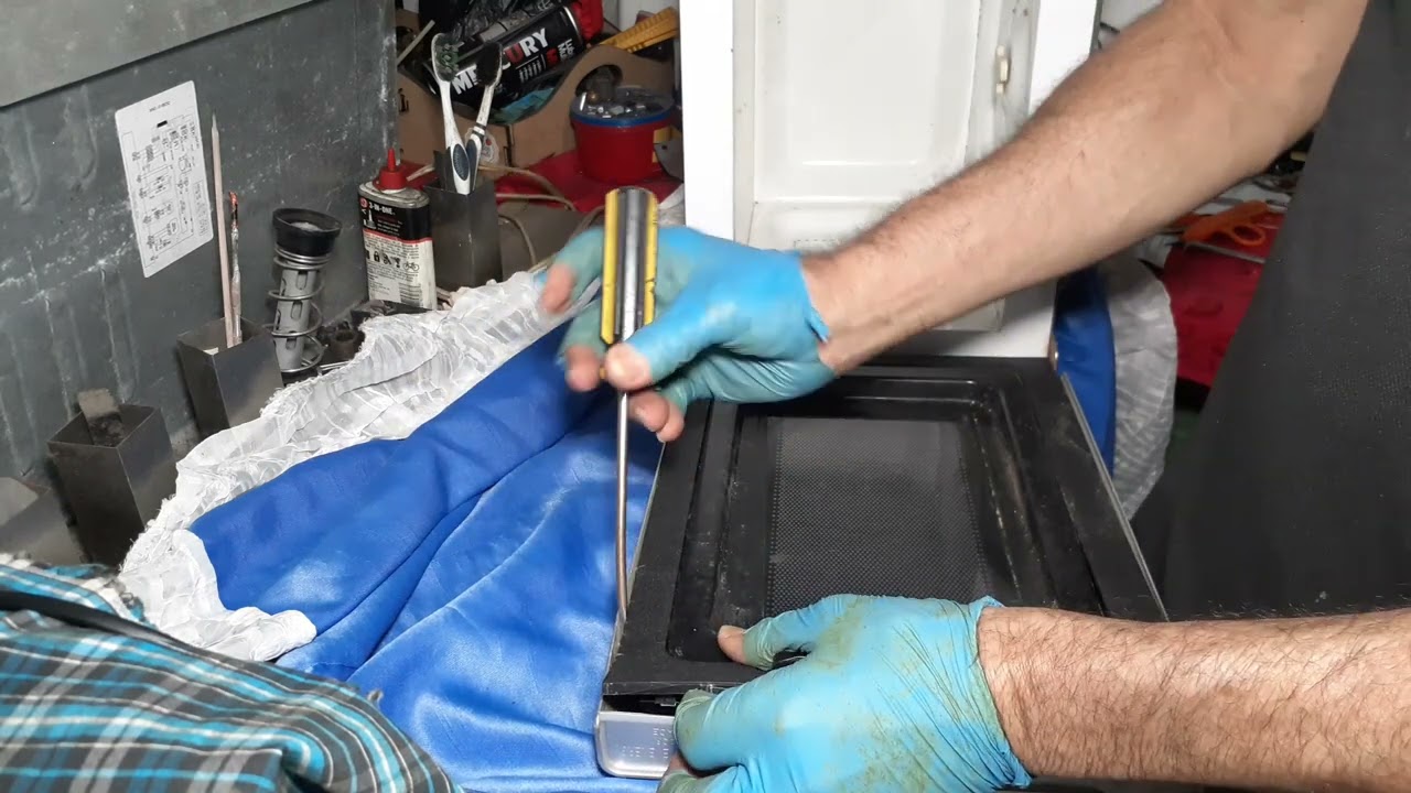 COMO  REPARAR SEGURO DE PUERTA  DE HORNO MICROONDAS