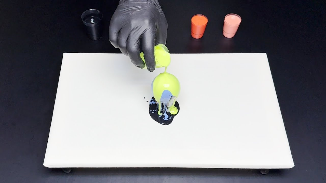 A fascinating liquid painting using a burnt-out light bulb
