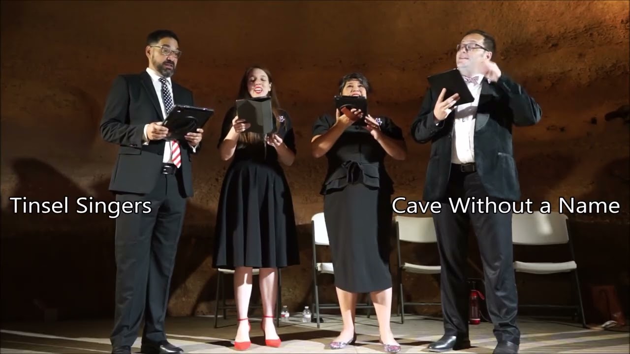 Somewhere Over the Rainbow, presented by the Tinsel Singers.