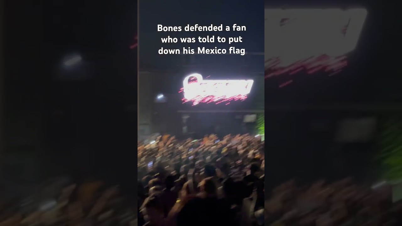 Bones defends a fan when he was told to put down his Mexico flag 
