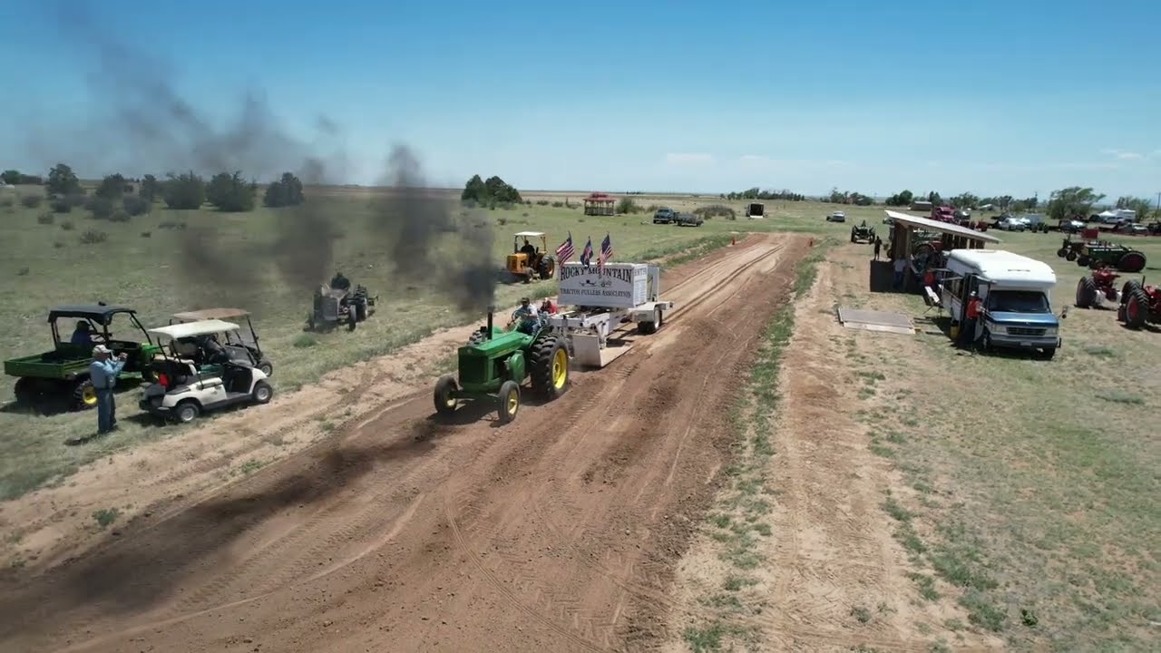 John Deere R Rolling Coal and Pulling Hard at Tractor Pull