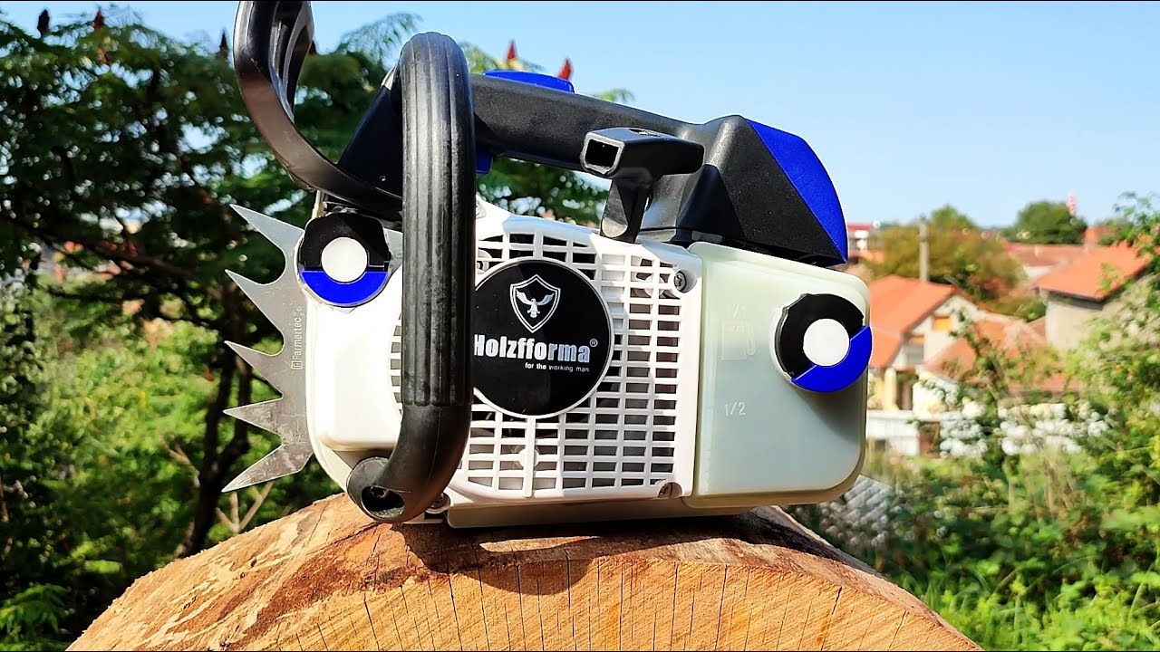 FarmerTec G111 35cc/2.1HP (Stihl MS 200T clone) - first start, first cuts, muffler mod, and more....