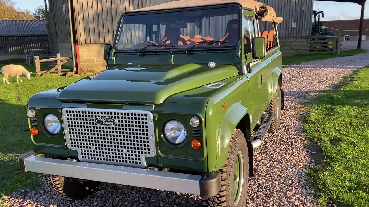 Winchelsea green Land Rover Defender 110 soft top by Lucari Design
