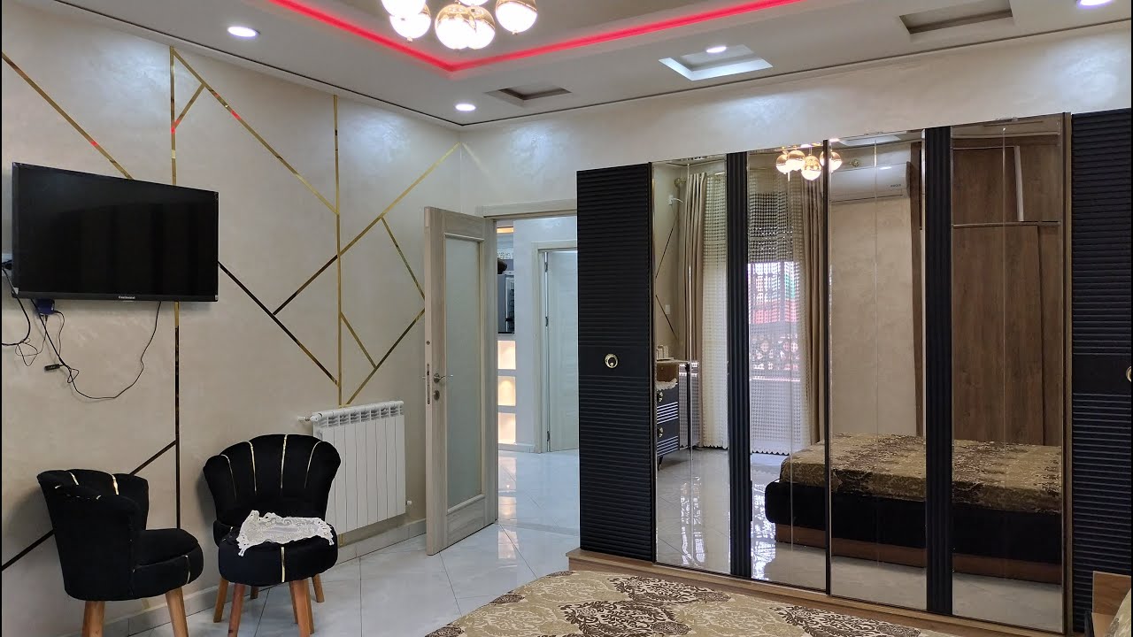 a vendre F4 acté 120m² luxe promotionnel 2 ème étage avec box  à belgaid Oran face promo Hassan
