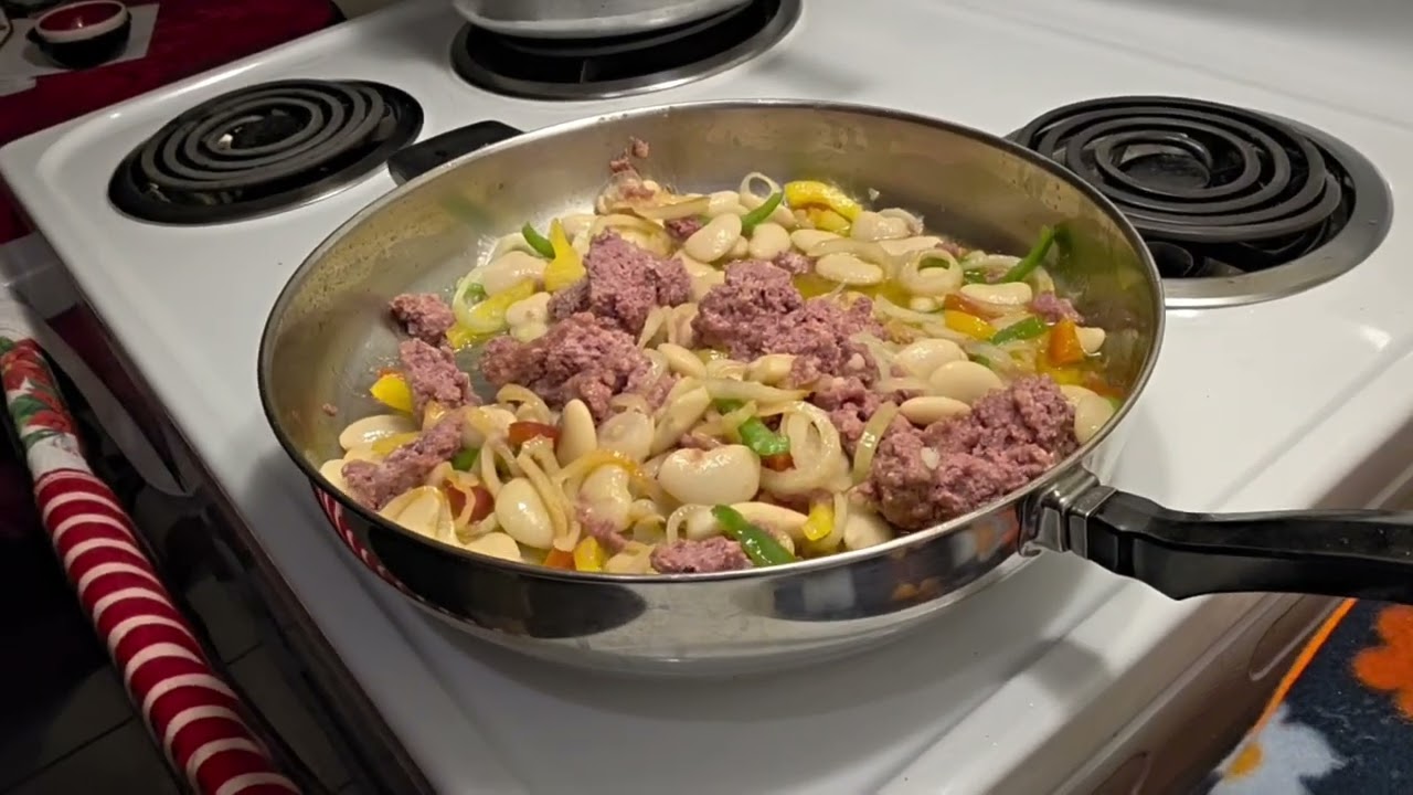 Let me show you how to make season Rice with corn, beef and beans.