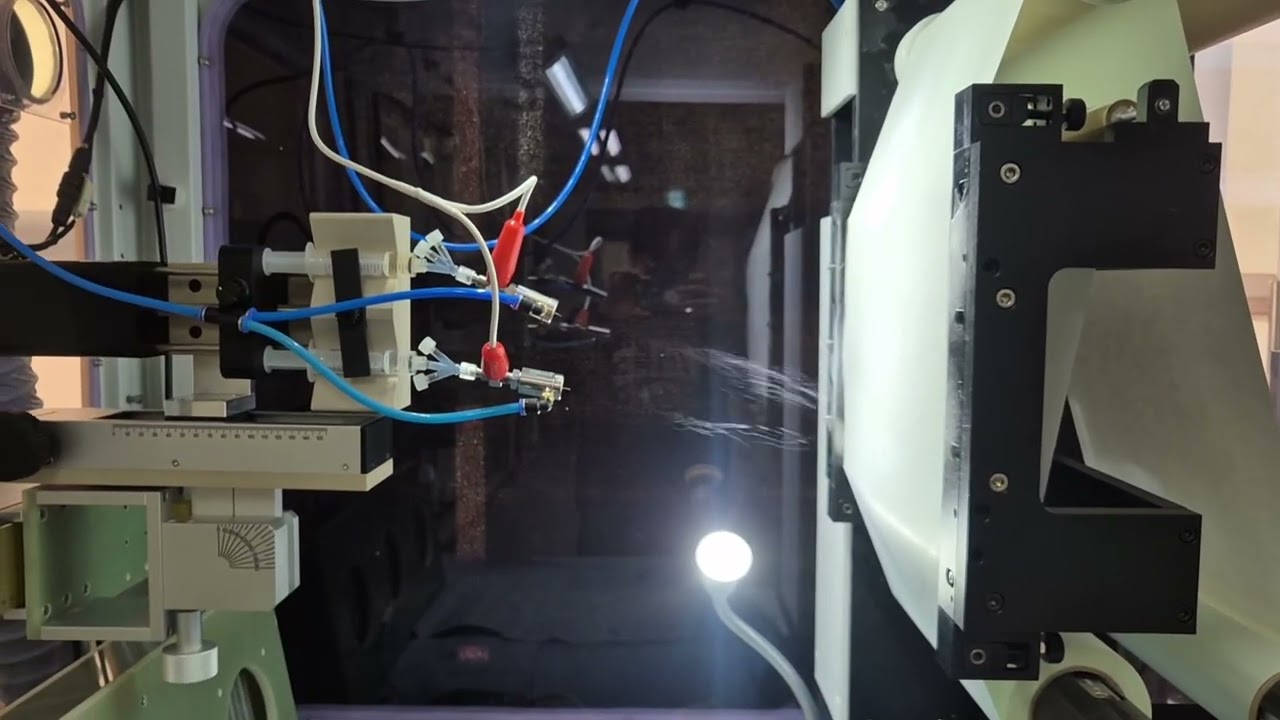 Manufacturing Composite PLGA Nanofibers web using Dual Electrospinning System by Air-jet nozzle