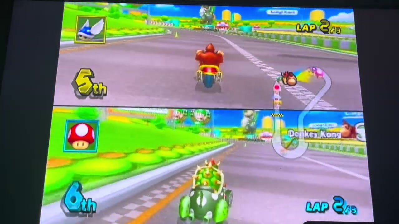 Mario Kart Wii Donkey Kong vs Bowser at Luigi Circuit