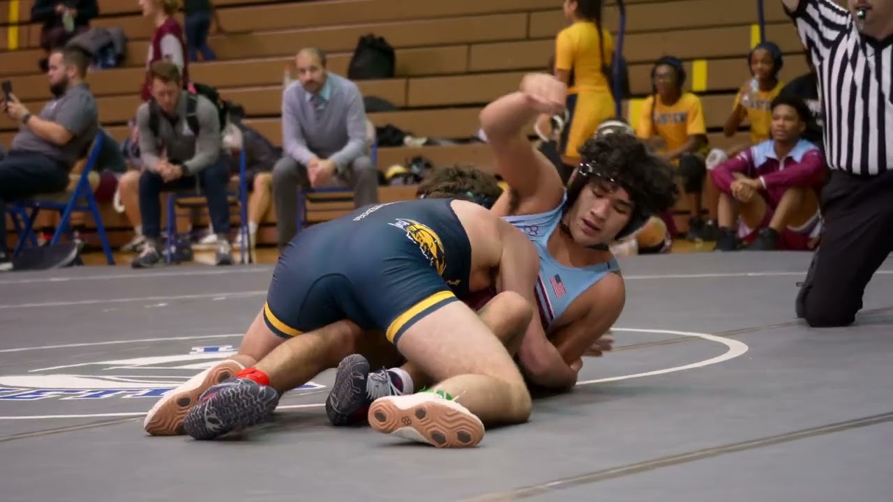 Okemos Wrestler Julian Solis Lopez, Don Johnson Invitation  Dec 7, 2024