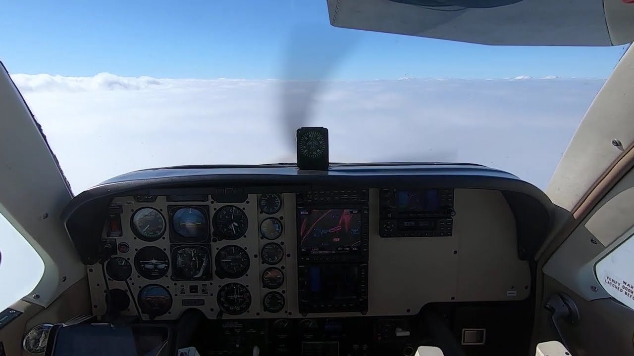 Speeding Just Over Clouds on Martinsburg WV Approach, in the Beech Bonanza