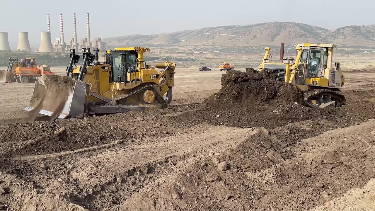 Caterpillar D9T And Komatsu D275 Bulldozers Leveling - Rehabilitating Huge Mining Area