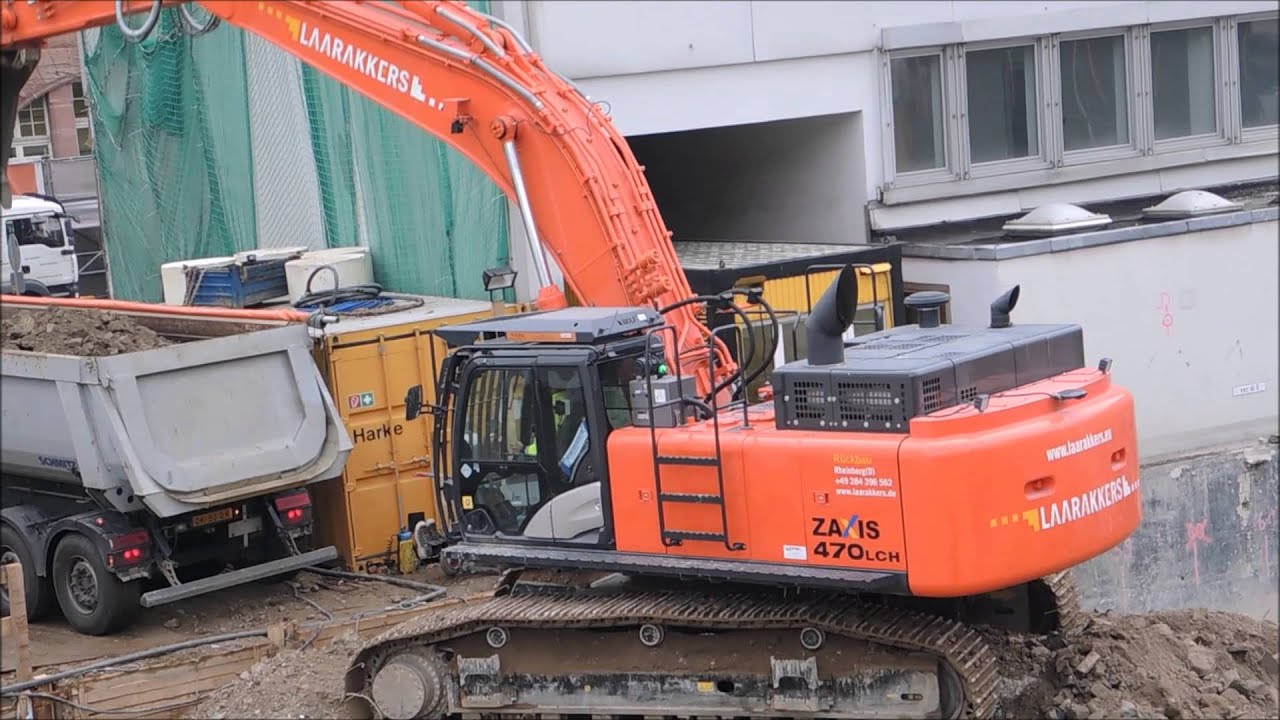 Excavator Zaxis 470 LCH and Volvo EC220 D and truck