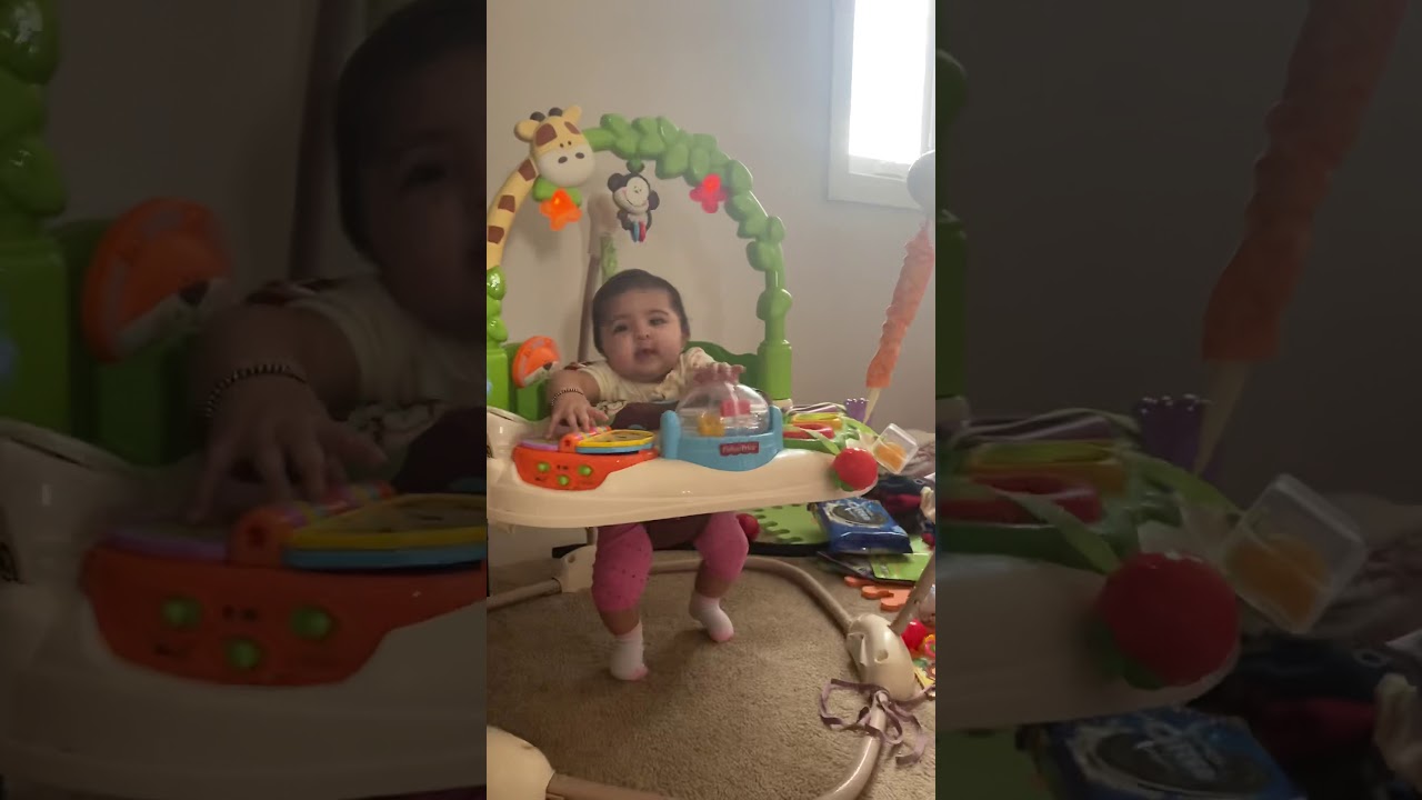Fisher-Price Sit to Stand infant toy, daughter is laughing