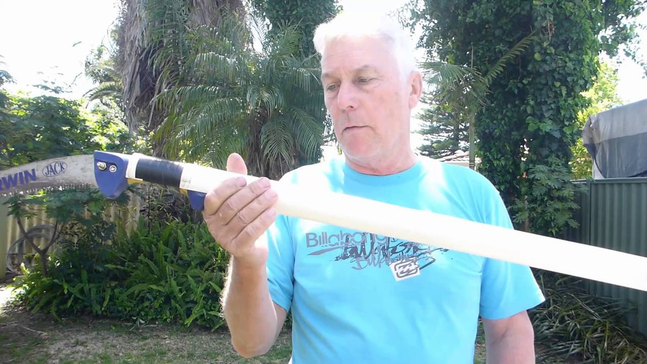 Cocos Palm Pruning using a Home Made Pole Saw