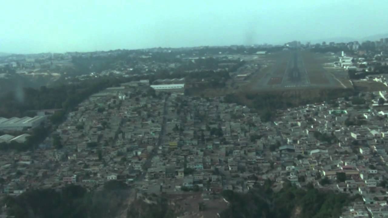 COCKPIT VIEW OF APPROACH AND LANDING AT GUATEMALA LA AURORA AIRPORT