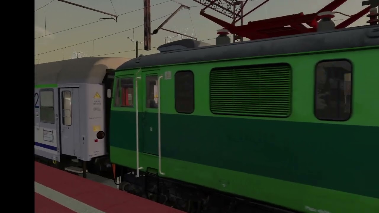 Eu07-052, odjazd TLK Piast ze stacji Wolica.   Gra - Maszyna