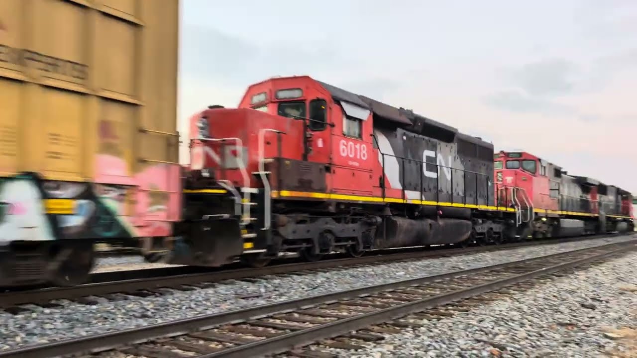 CN 6018, an SD40-2Q, trails on CN Freight Train