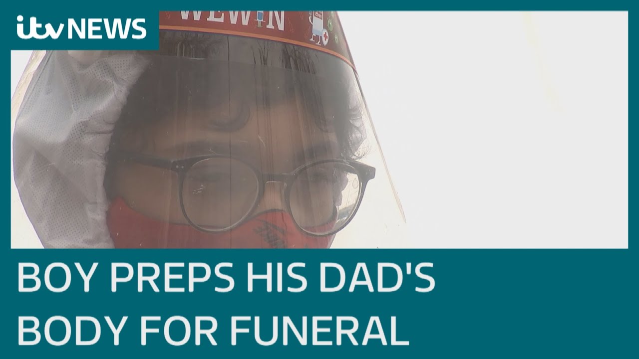 Covid in India: Boy, 13, prepares father's body for funeral at roadside crematorium | ITV News