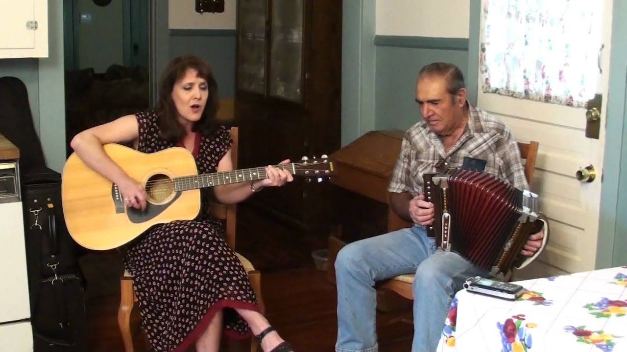 Lisa Trahan and her dad Harry perform the traditional Cajun tune Marais Buller