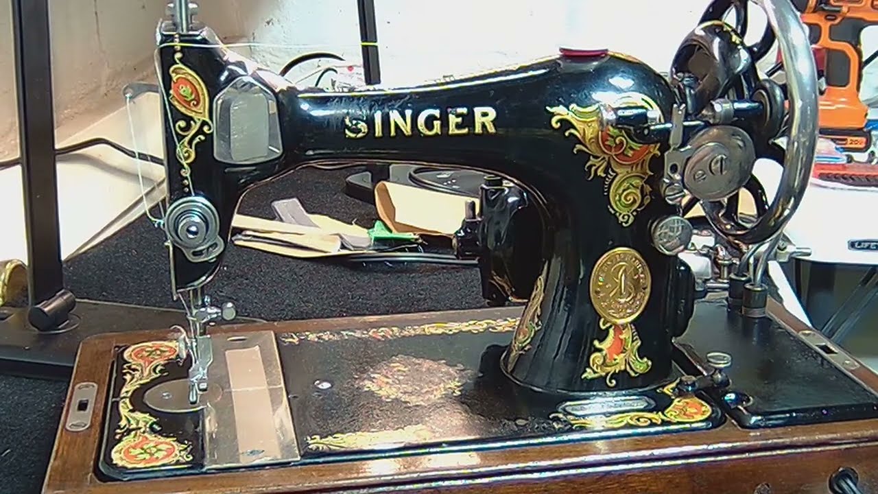 Granny Lucille's cherished 3/4 size Singer 128,...held now close to the heart by Princess Diana