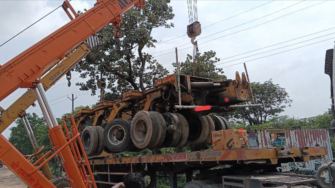 Two hydra unloading heigh weight truck wheels at BHL jhansi