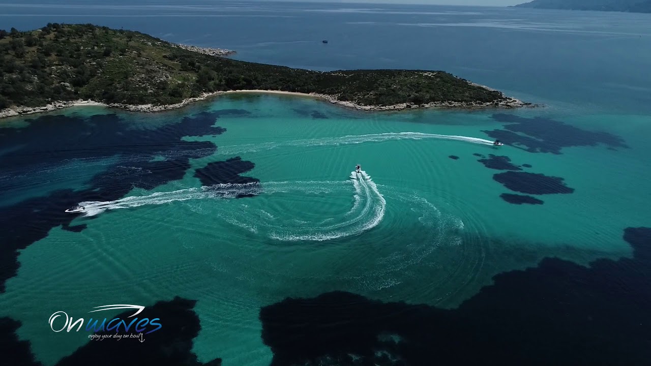 Blue Lagoon of Diaporos island in Vourvourou Halkidiki. Amazing view by drone!
