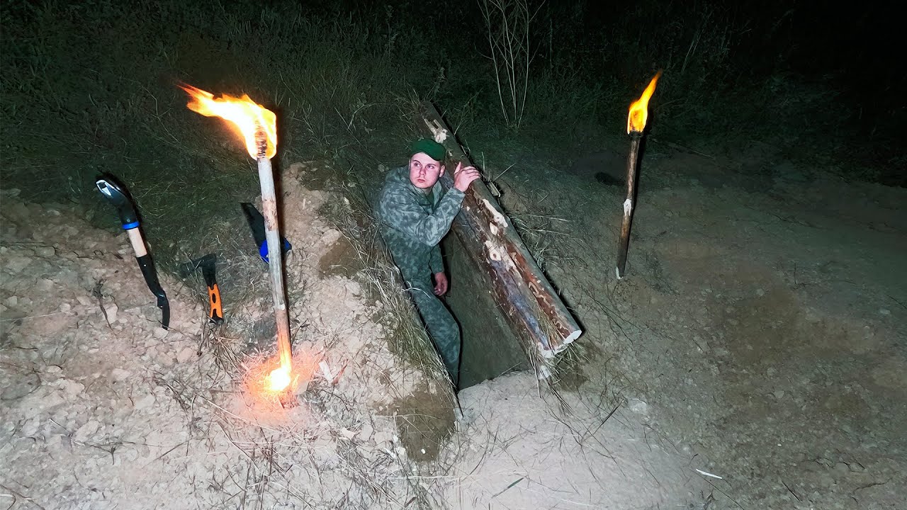 Building a secret cave inside a large rock. bushcraft survival