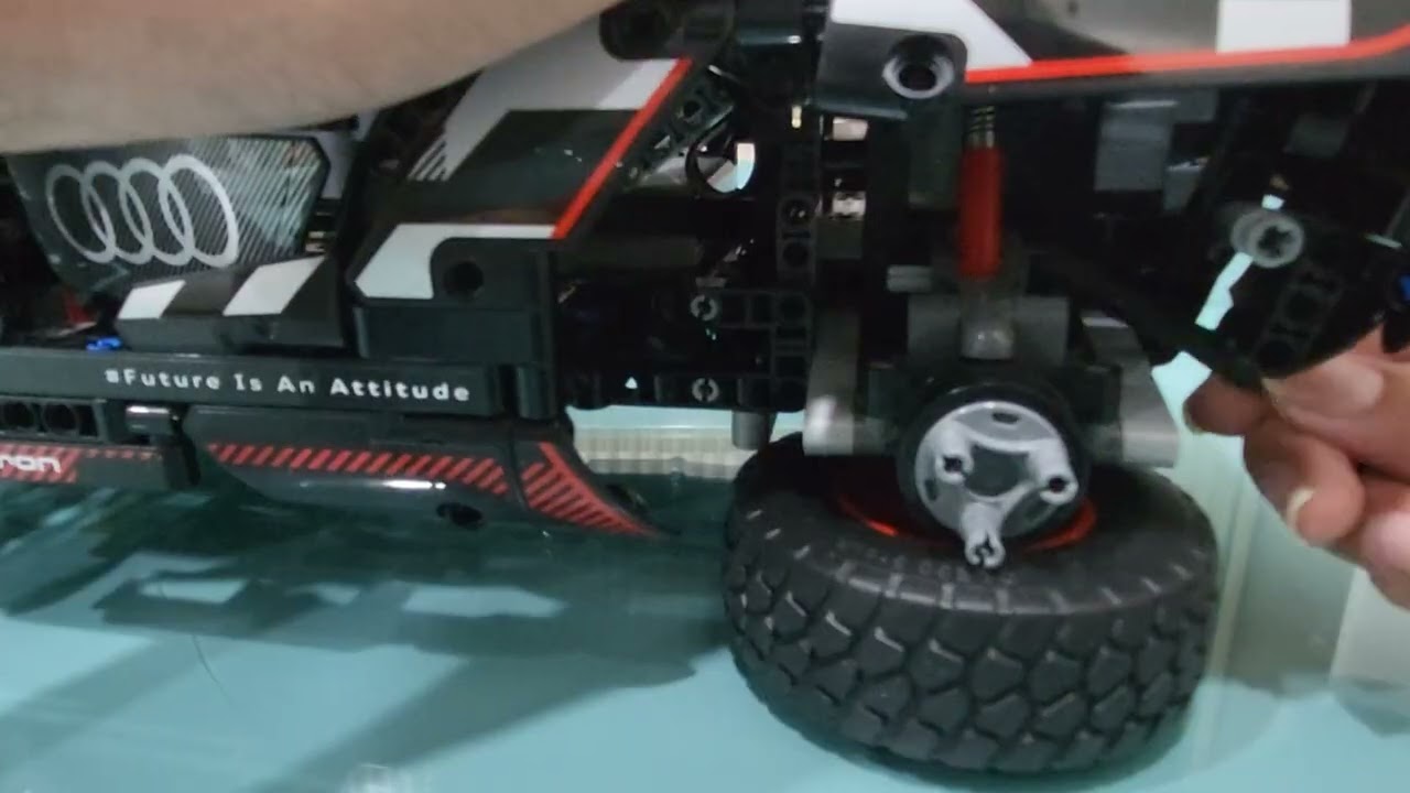 Solving the problem of pre- compressed spring in the lego audi rs q e-tron 