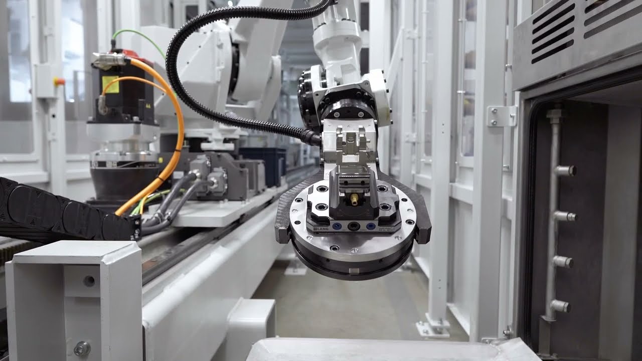 6-Achs Robotersystem belädt 4 FEHLMANN VERSA 645 linear