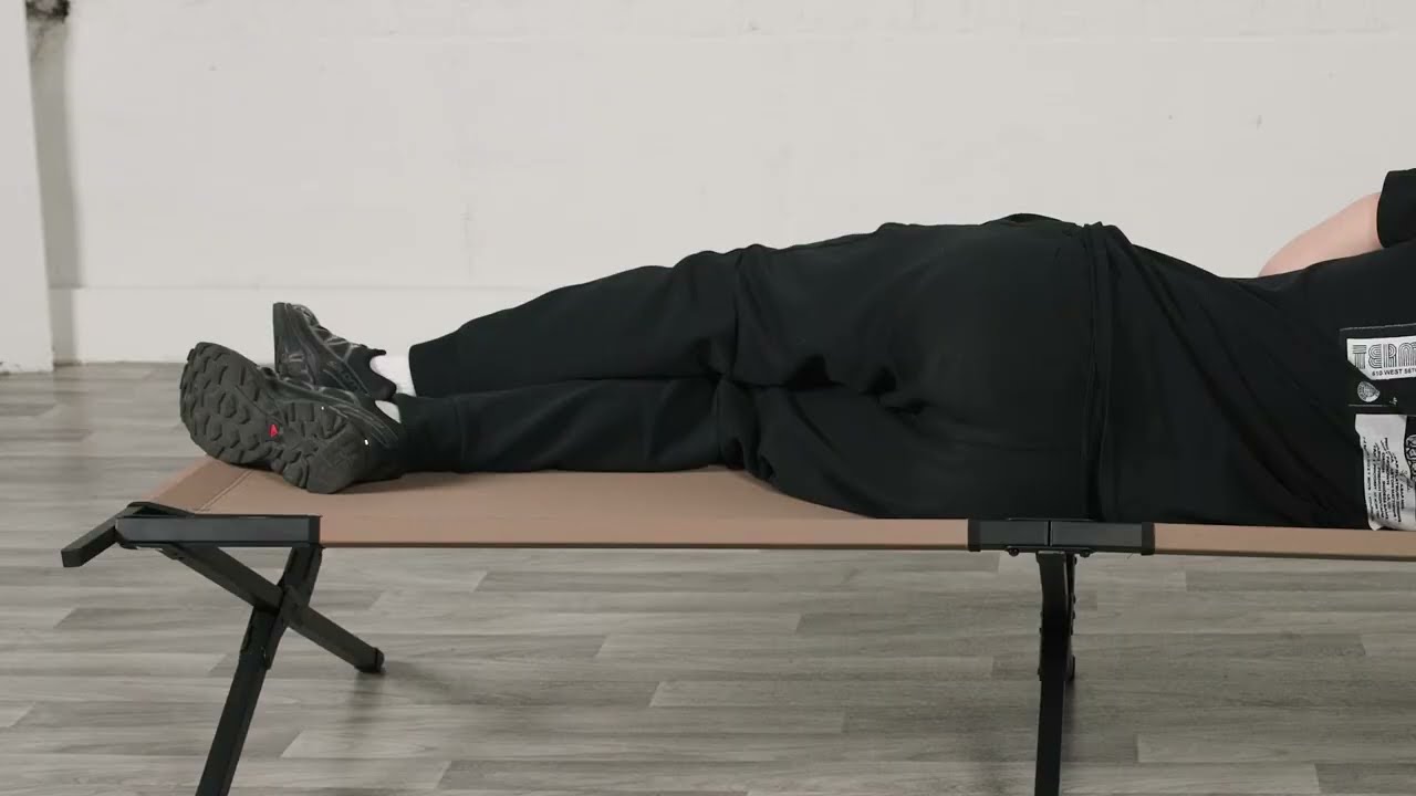 Overview: Relax in comfort with the Coleman Trailhead II Large Folding Cot