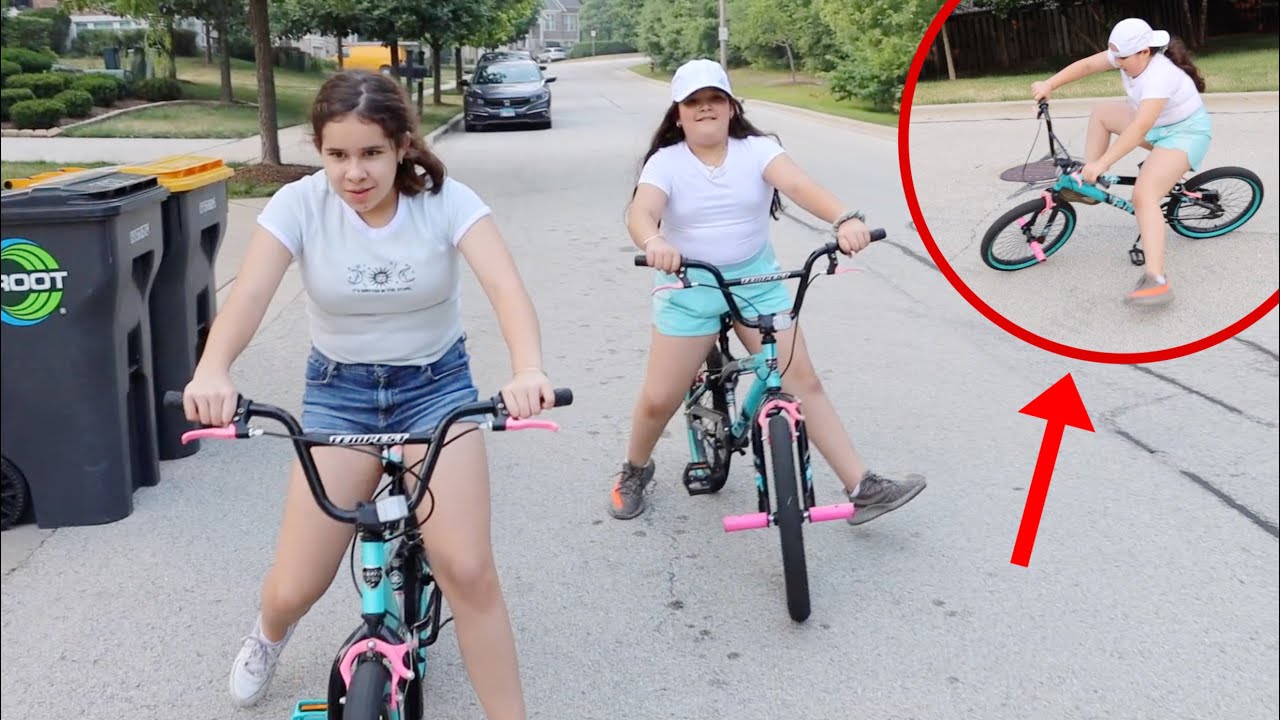 Teaching my sisters how to ride a bike!