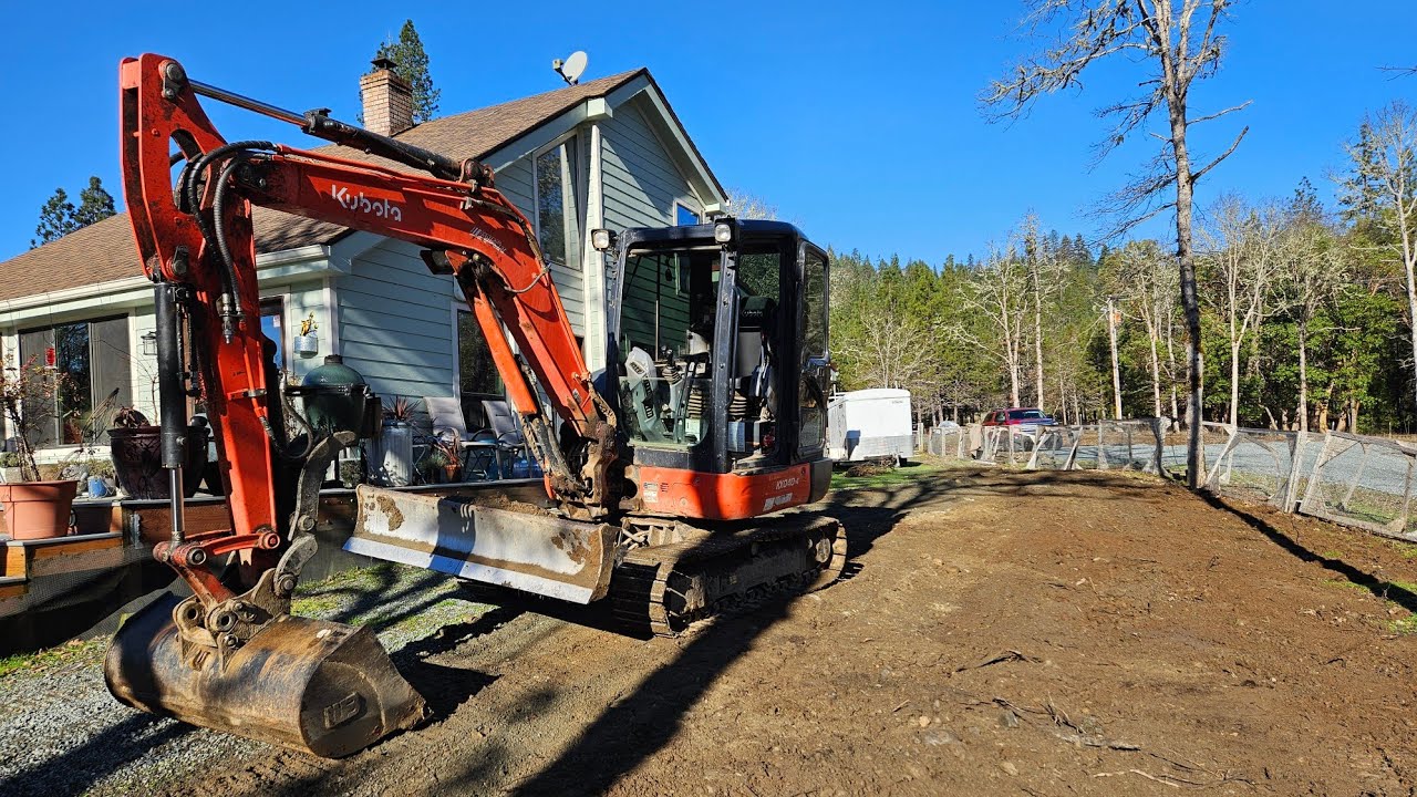 I screwed up and some slope grading with the Kubota KX 040 4 excavator