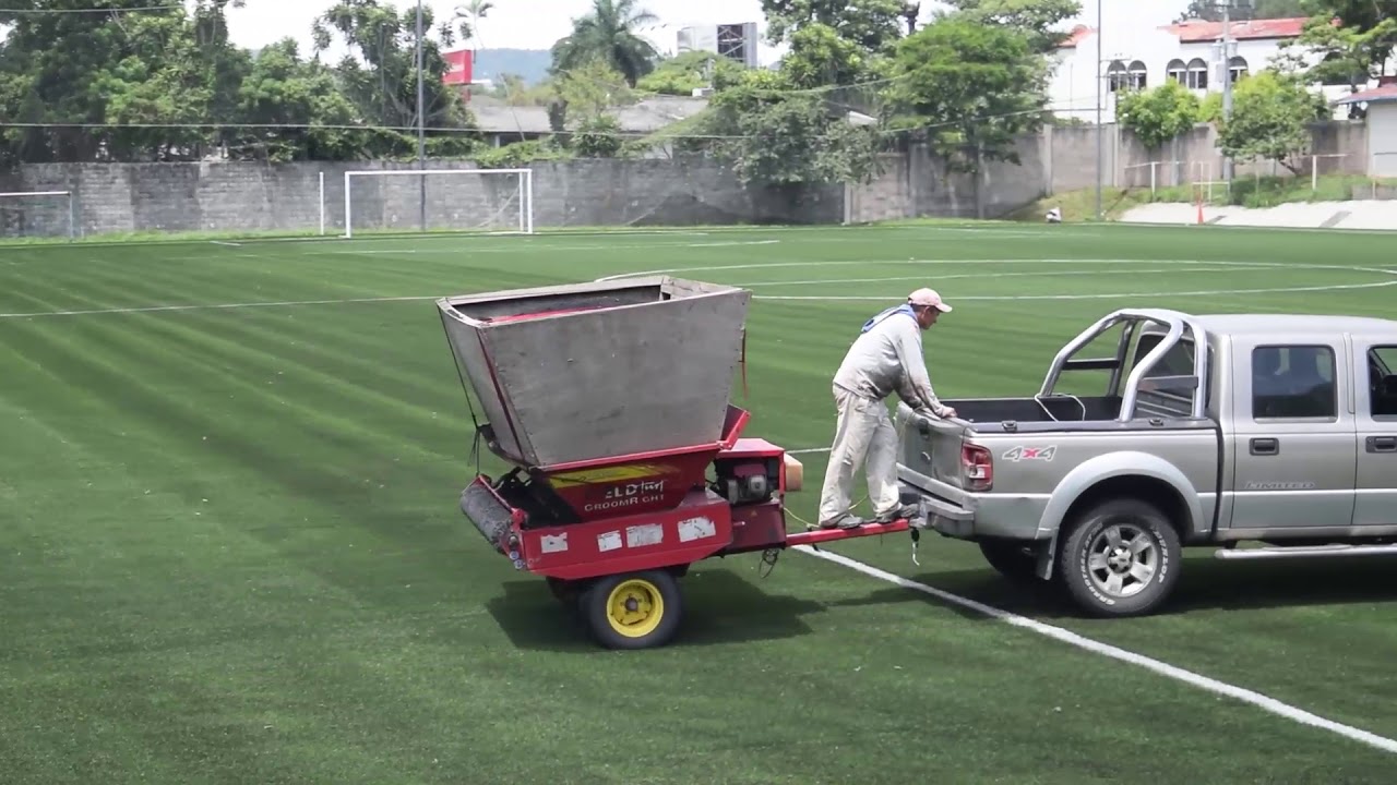 Aplicación de Caucho Granulado en cancha #1