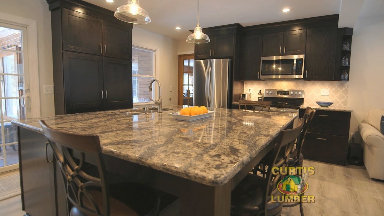 Traditional Kitchen in Wilton, NY by Curtis Lumber Kitchen Designer Maria S.
