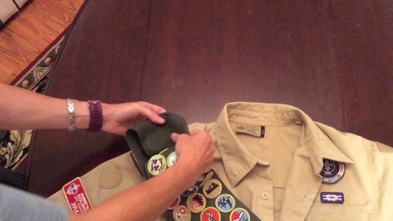 How to use hook and loop to attach merit badge sash.