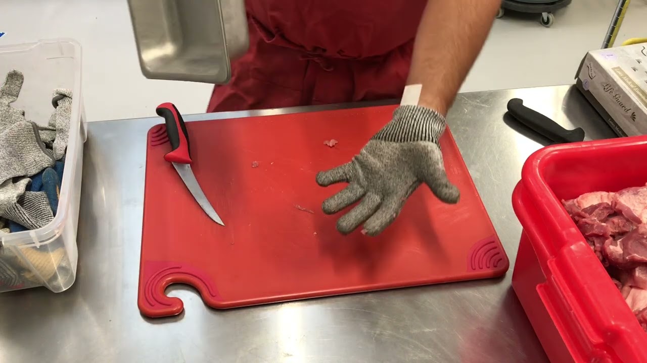 Butchering Pork Butt--removing fat cap, deboning, cutting to size for grinding into sausage