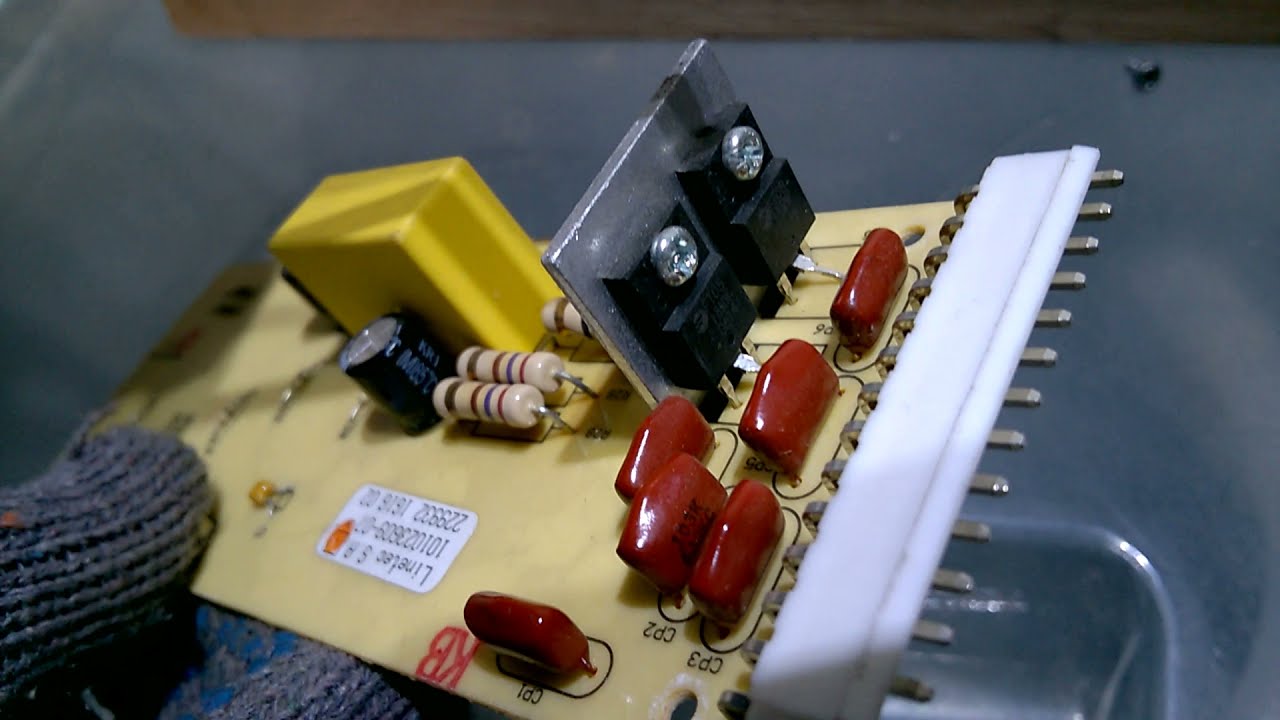 Lavarropas drean 5.05 con placa deteriorada. Verificación de componentes con lámpara en serie.