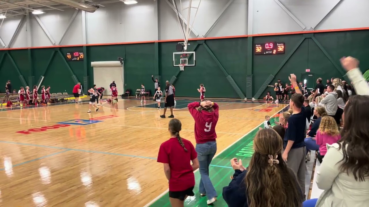 UNBELIEVABLE SHOT AS THE BUZZER SOUNDS , JR . PATRIOTS WIN 34 TO 32 OVER TUG VALLEY TODAY 