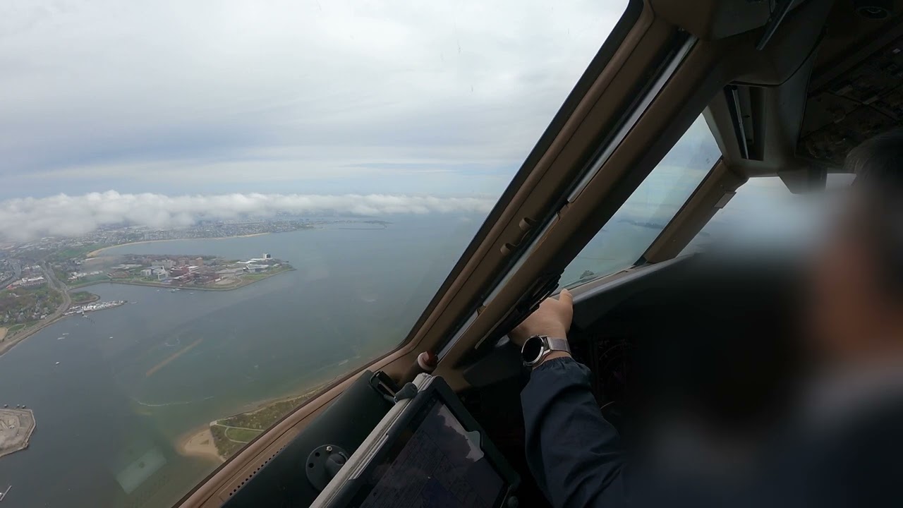 captain J B performing auto land on R/W04R  Boston