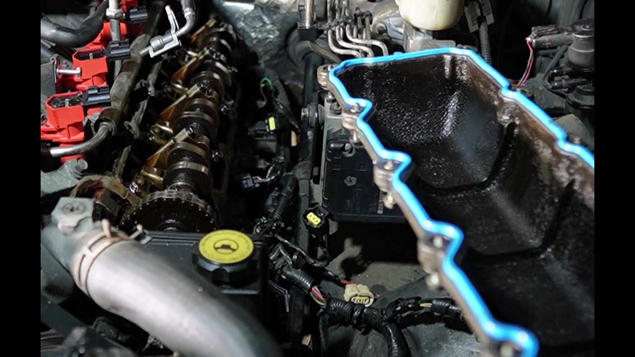 Changing valve cover gaskets and lifters on Jeep Grand Cherokee 99 thru 04