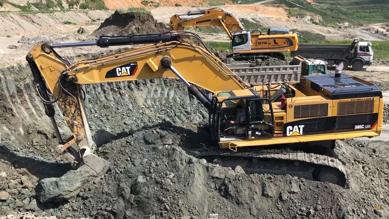 Caterpillar 385C Liebherr 976 And Liebherr 974 Excavators Loading Trucks - Sotiriadis/Labrianidis
