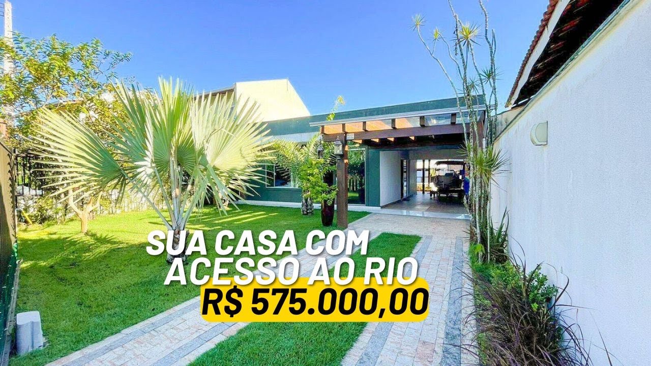 Linda Casa a venda em Balneário Barra do Sul fazendo fundos ao Rio com Rampa + Deck + Piscina