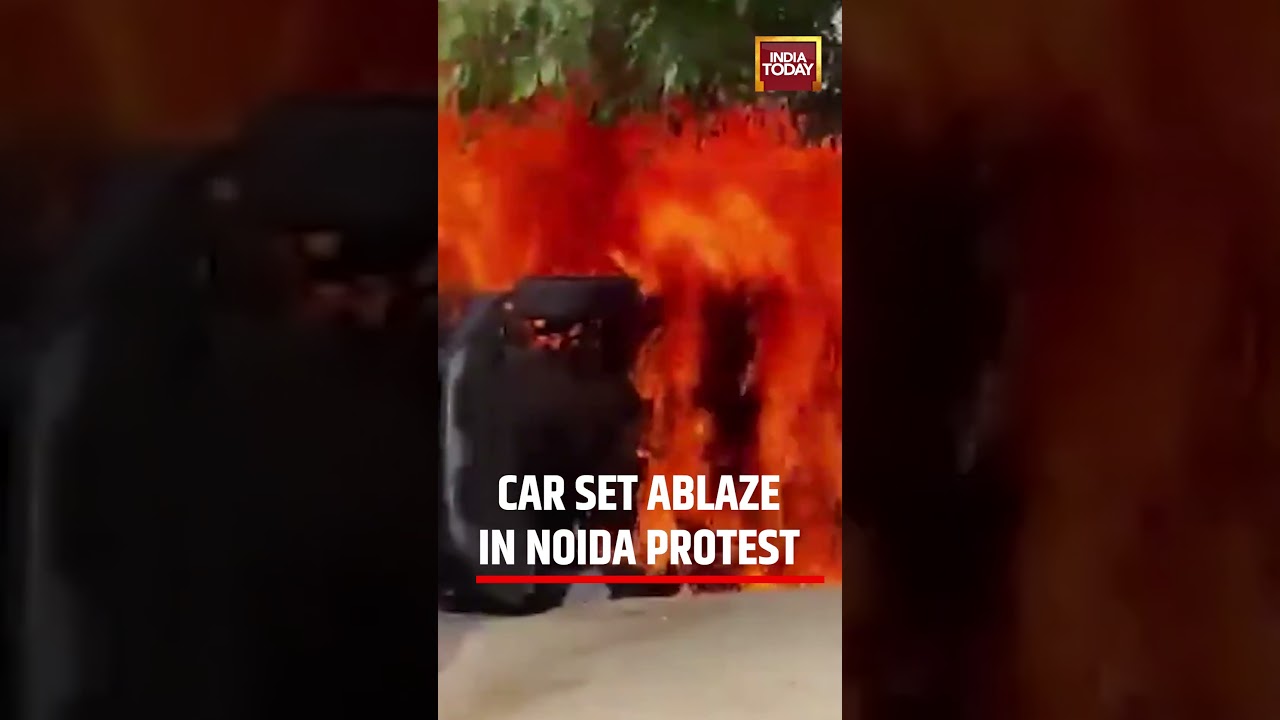 Noida Protest: SHOCKING Visuals from Noida as Car is Set Ablaze Amid Ongoing Protests #noidaprotest