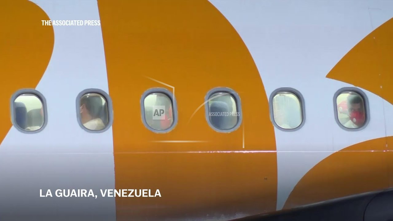 Venezuela migrants deported from US return home to welcome by interior minister