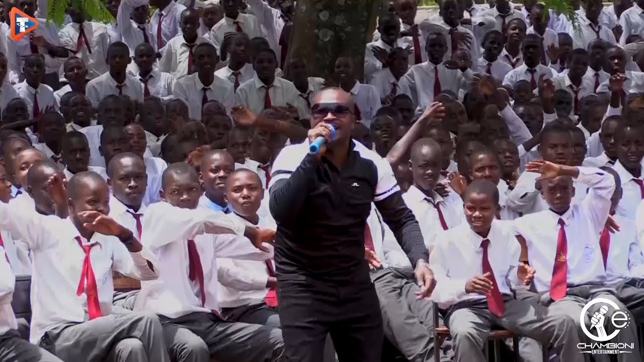 MIGGY PERFORMING SAMUELI  AT CARDINAL OTUNGA HIGH SCHOOL